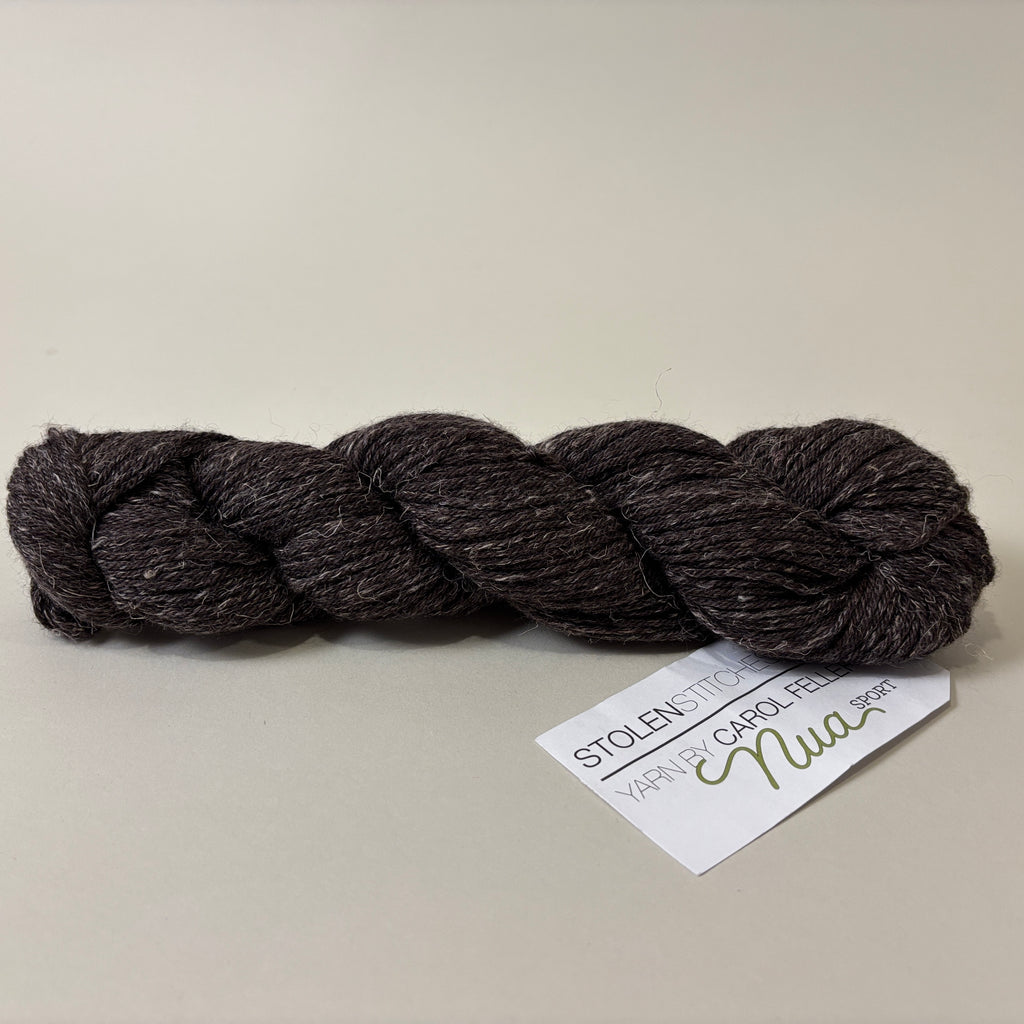 Stolen Stitches Nua Sport yarn in Kitten Fluff