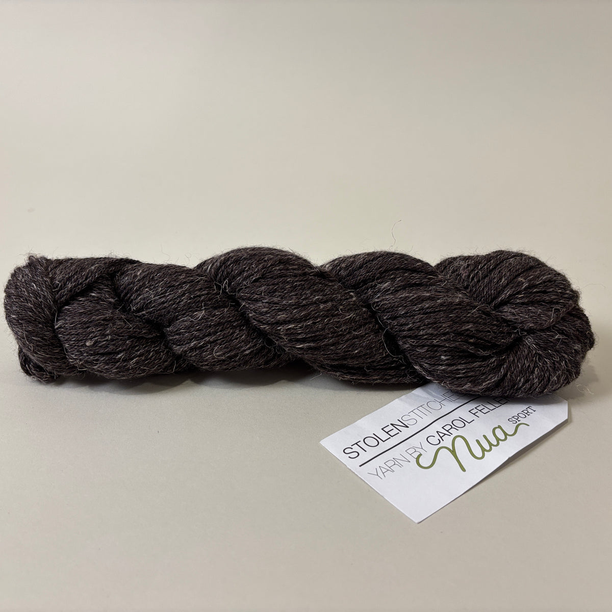 Stolen Stitches Nua Sport yarn in Kitten Fluff