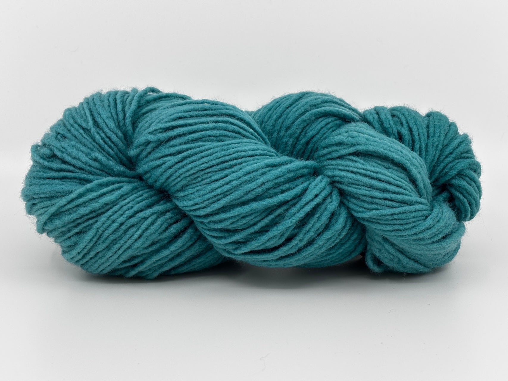 A skein of Maxima yarn by Manos del Uruguay in color Jade