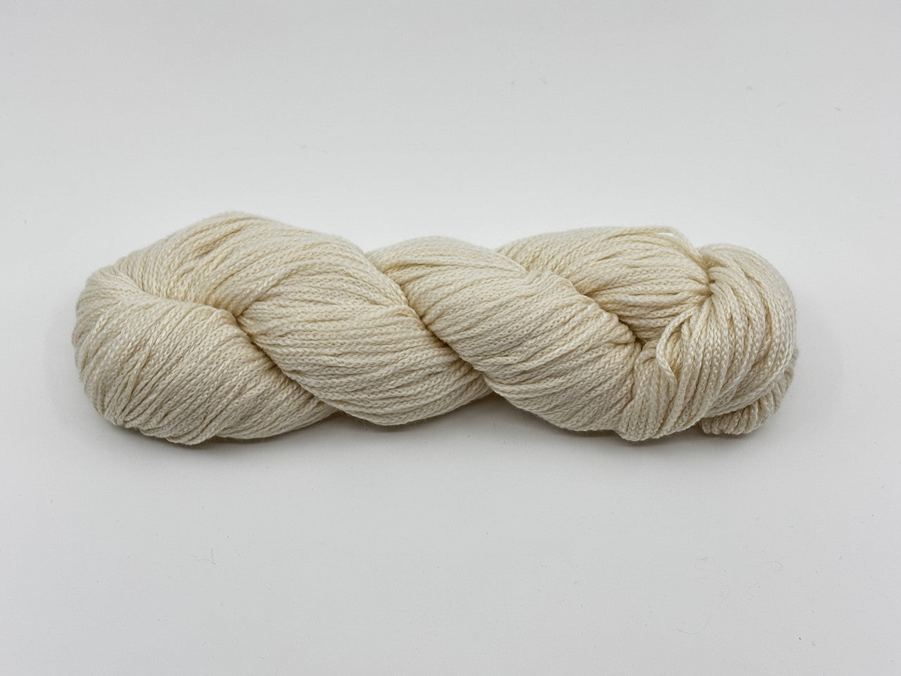 A skein of Woolfolk Brise yarn