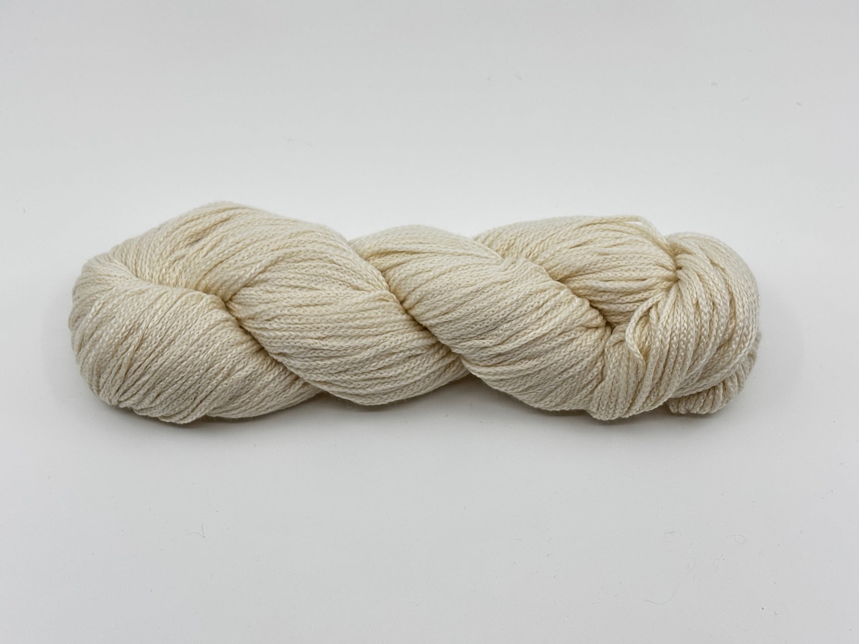 A skein of Woolfolk Brise yarn