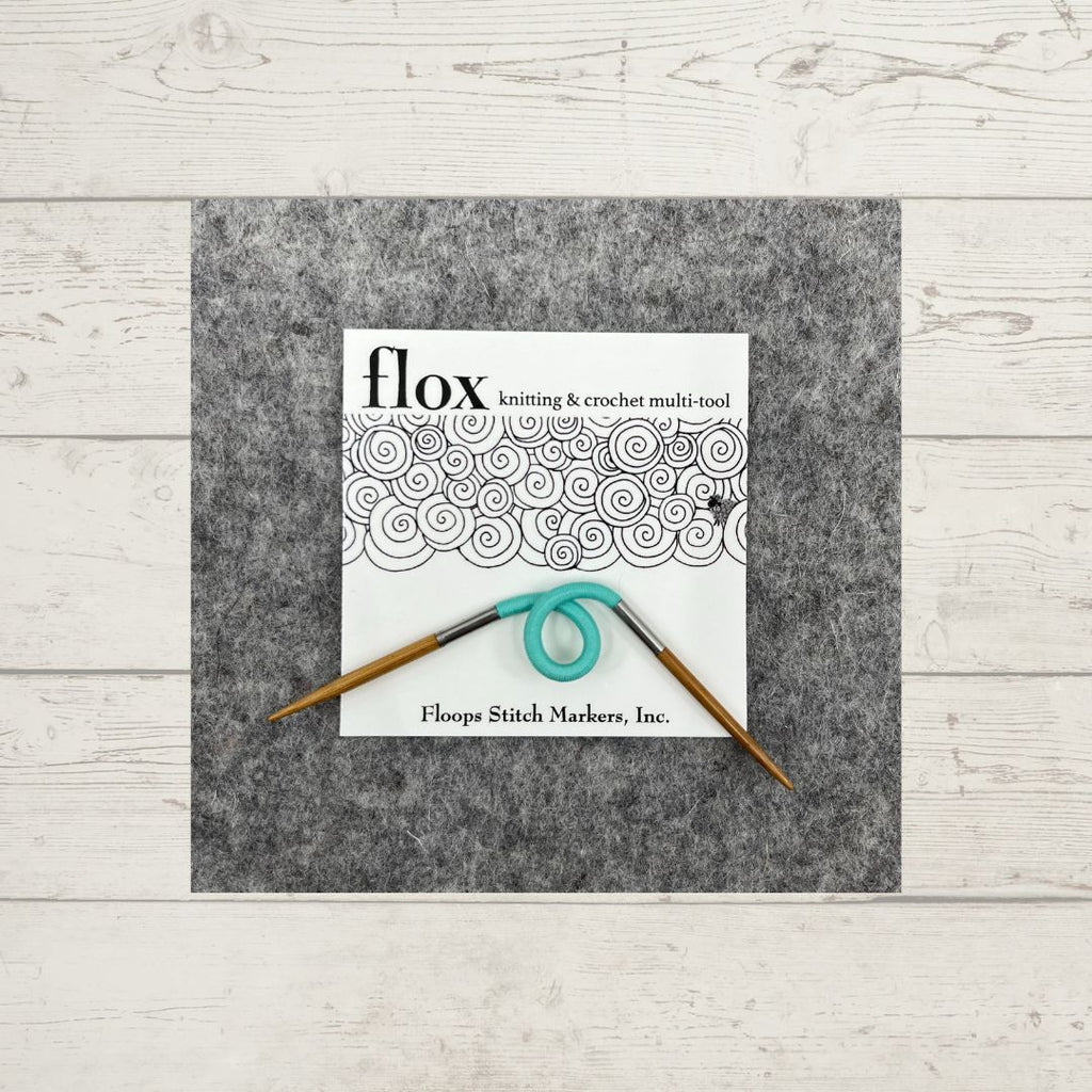 Solid-colored Flox Multi-tool with packaging