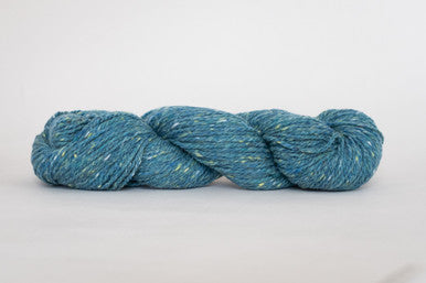 A skein of Kelbourne Woolens Lucky Tweed yarn