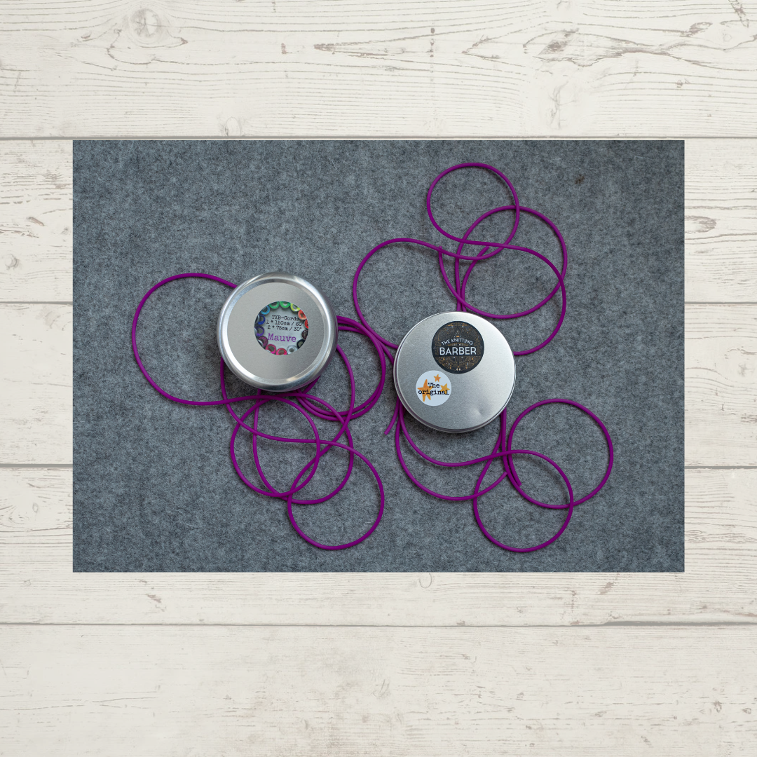 The Knitting Barber Cord Set, with the tin open and showing all the cords