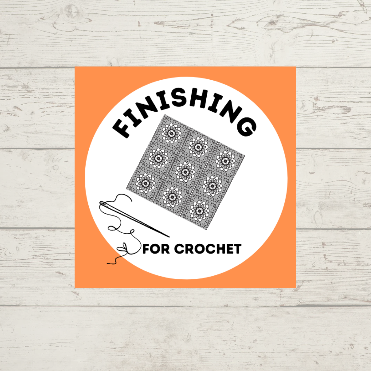 Finishing for Crochet class -- picture shows a crocheted afghan and a yarn needle and yarn