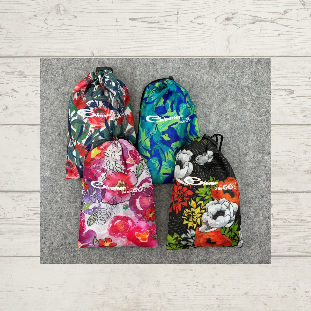 Gleener® Compact Travel Fabric Shaver & Lint Brush, shown in assorted colors