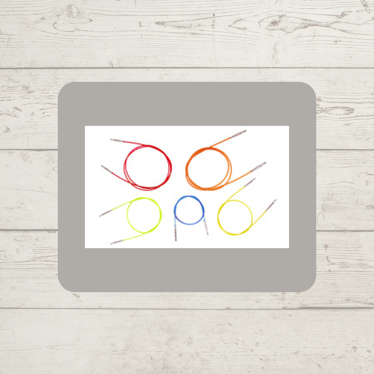 Knitter's Pride Interchangeable Needle Cables, shown in various sizes and colors