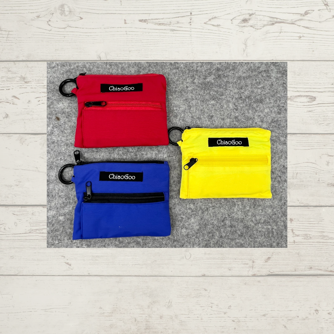 ChiaoGoo TWIST Shorties Interchangeable Knitting Needle Sets, shown in red (US 0-3), blue (US 4-8), and yellow (US 9-11)